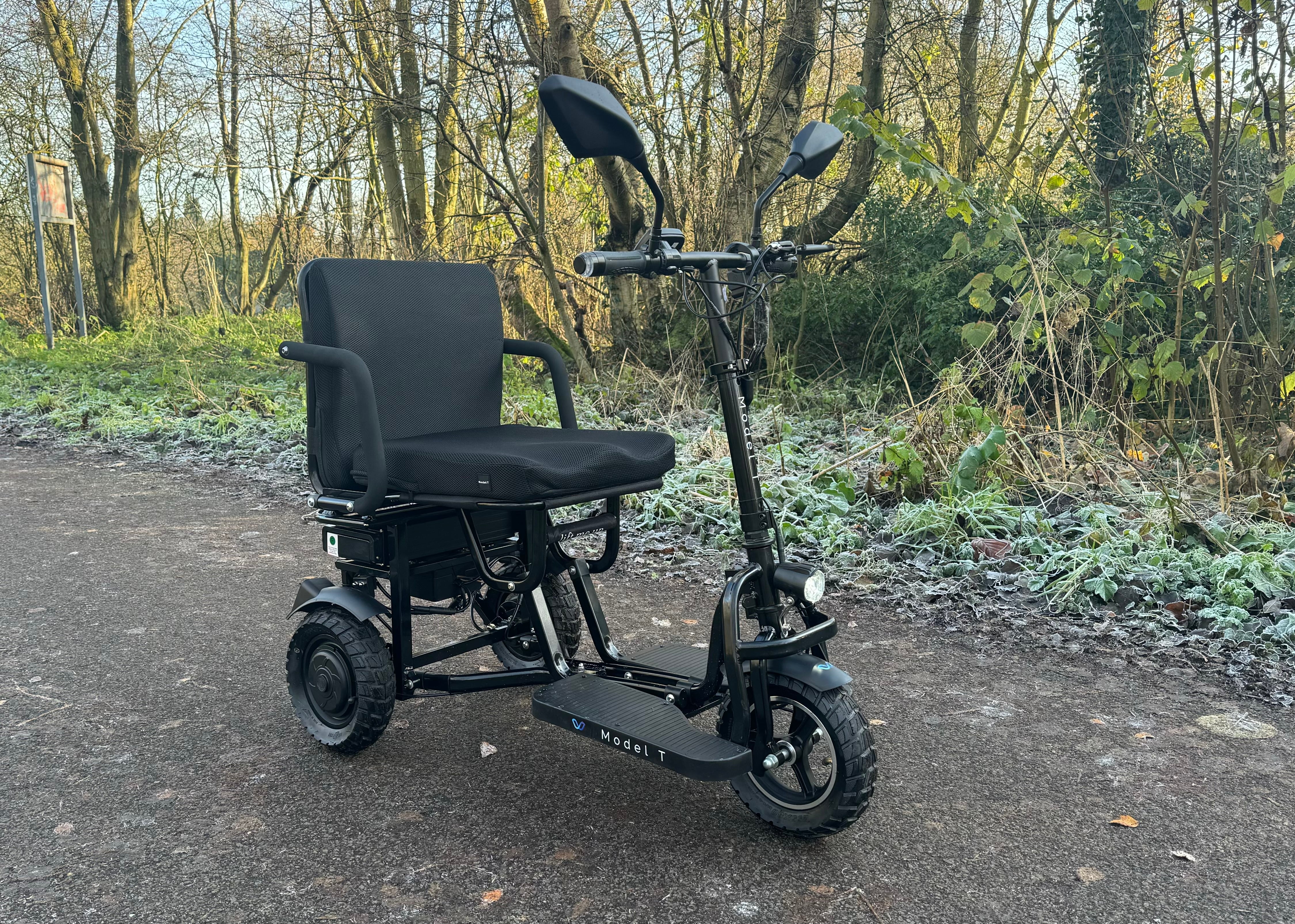 Motus - Model T All Terrain Scooter on Gravel Path